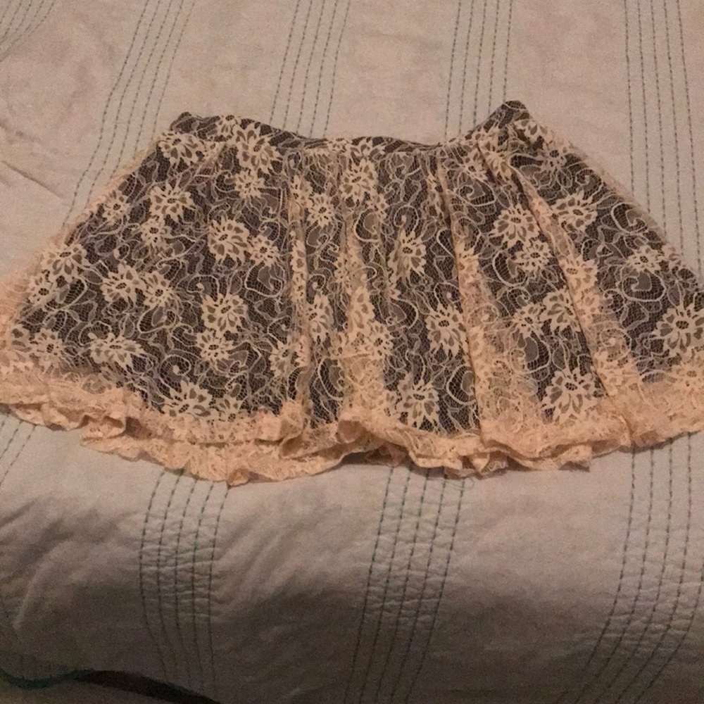 Elastic waist skirt. Black with pink over lace.